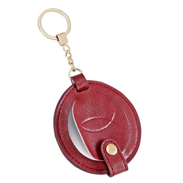 Schlüsselanhänger mit Kosmetikspiegel und Ichthys-Prägung